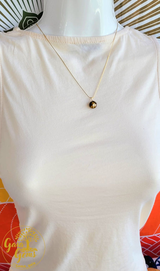 Amuleto del Despertar: Collar de Ojo de Tigre Facetado
