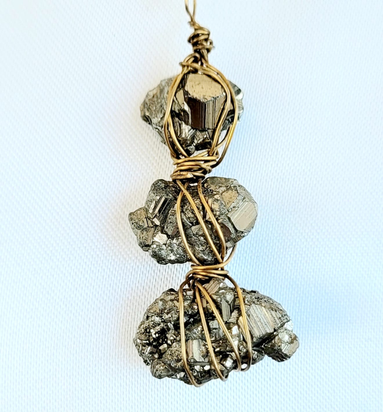 El Trío de la Fortuna: Collar de Pirita